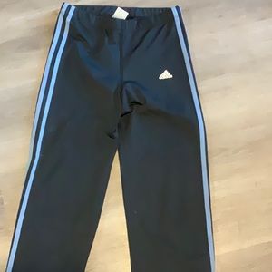 Black Adidas pants with blue stripes